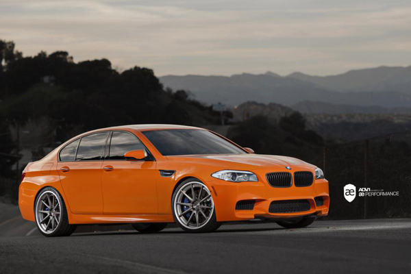 BMW M5 (F10) Valencia Orange от AE Performance